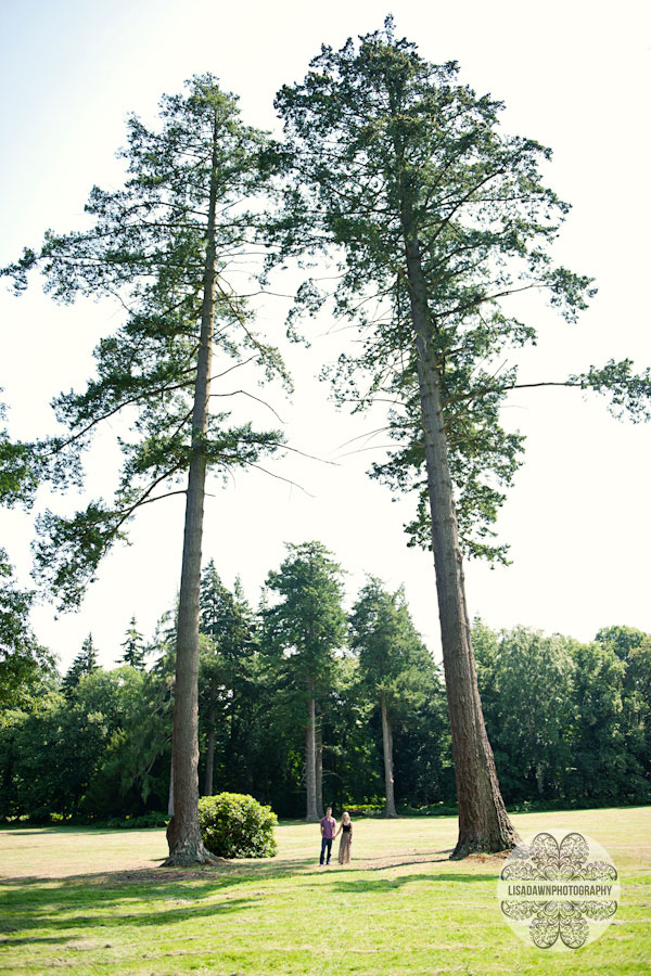 A creative photograph of a bride and groom to be standing hand in hand