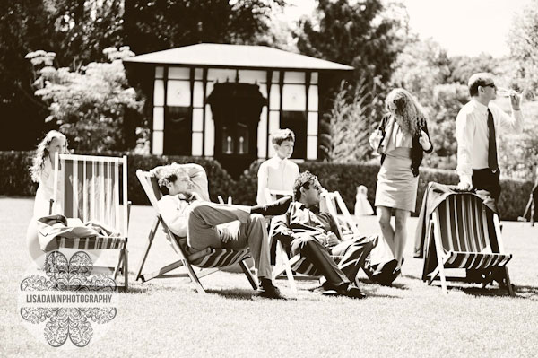 wedding guests chilling on the lawn