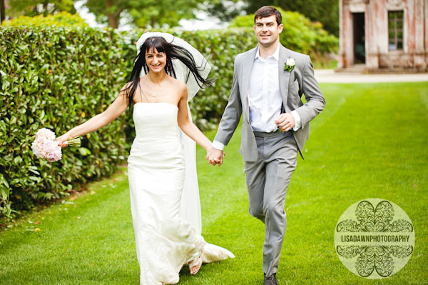 fun photograph of bride and groom running