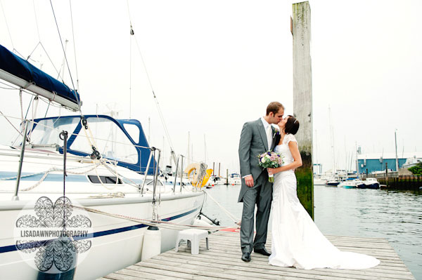 Bride and groom on jetty lymington quay