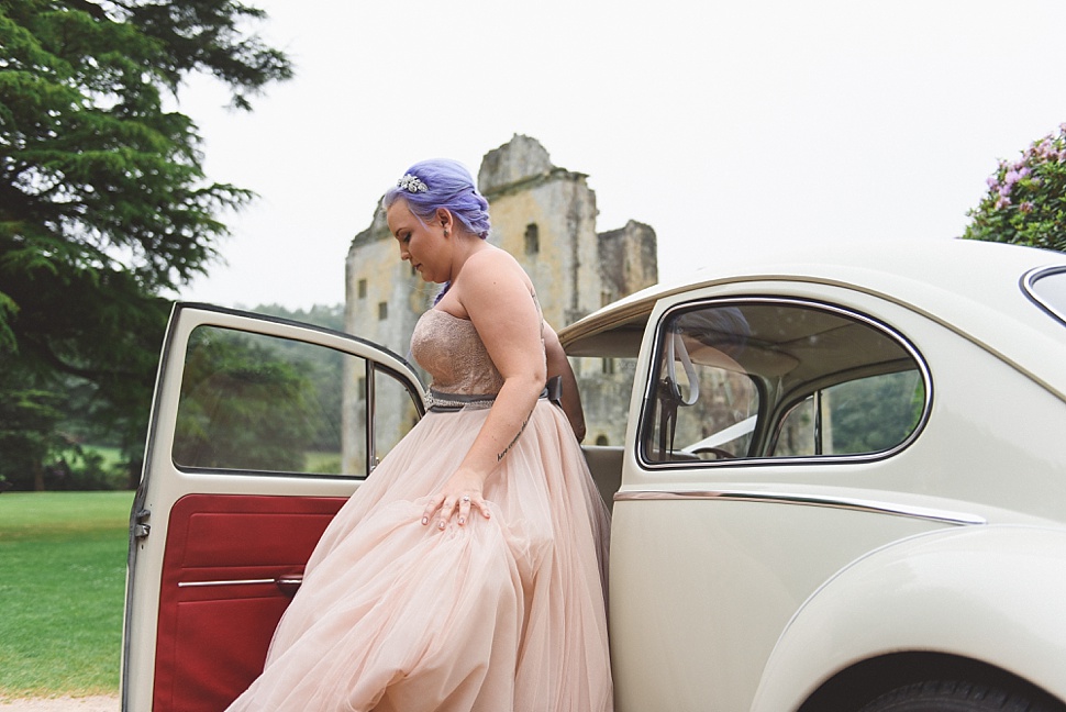 Bride arrives in VW beetle