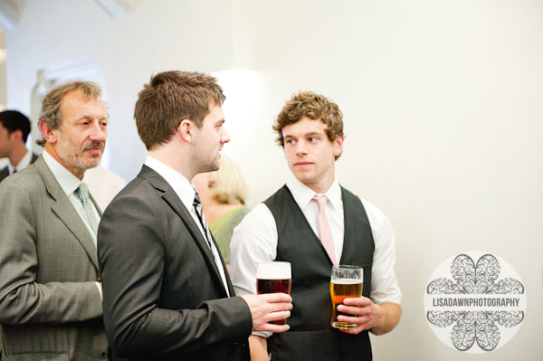 guests holding pints