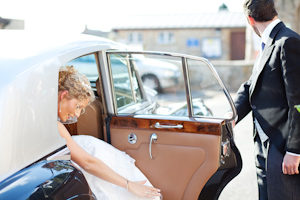 Bride getting out of car