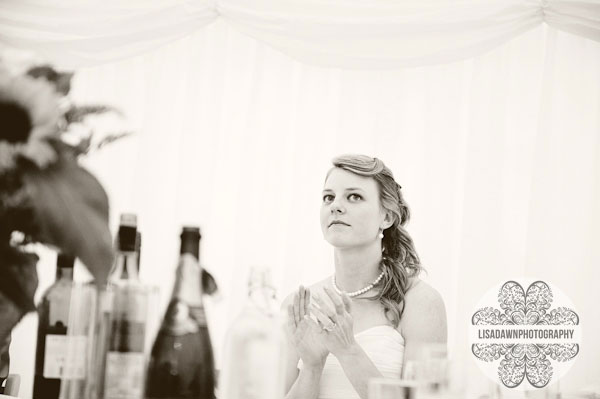 Bride clapping marquee wedding