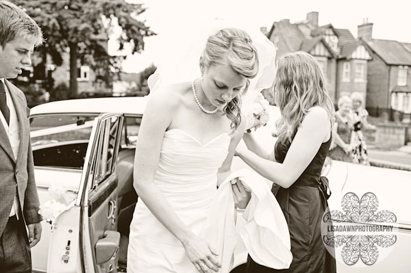 Bride getting out of car