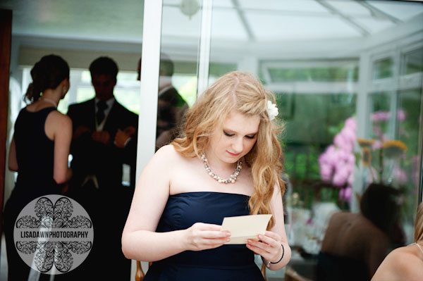 Bridesmaid reading letter