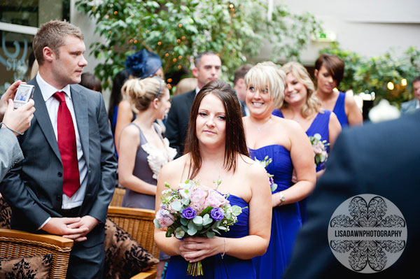 Bridesmaids walking down the aisle