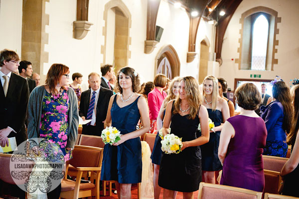 Bridesmaids walking down the aisle