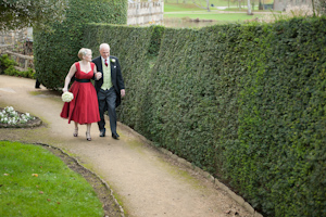 Bride and father gardens