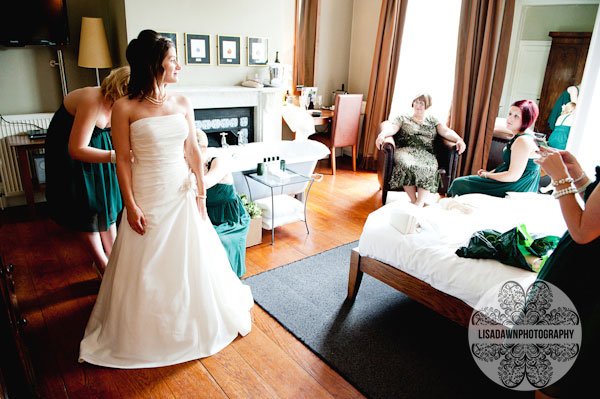 bride getting into her dress