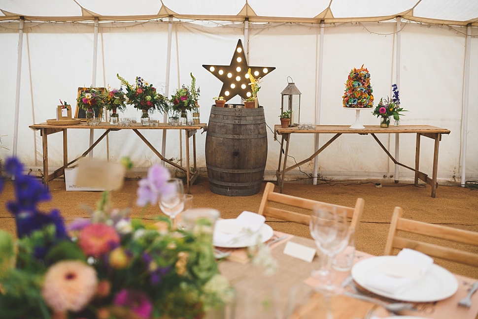 Colourful rainbow festival wedding flowers