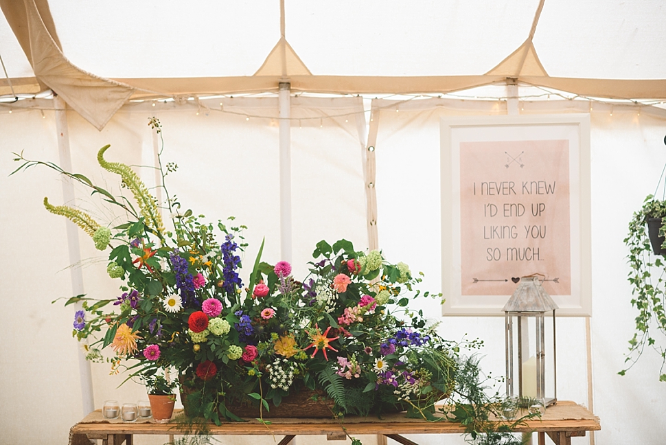 Colourful rainbow festival wedding flowers