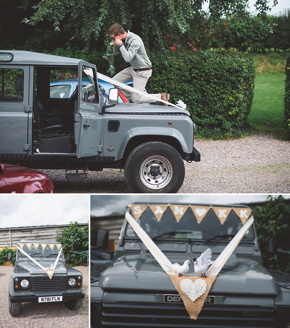 Decorated landrover wedding car