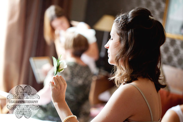 bride picks up wedding flowers