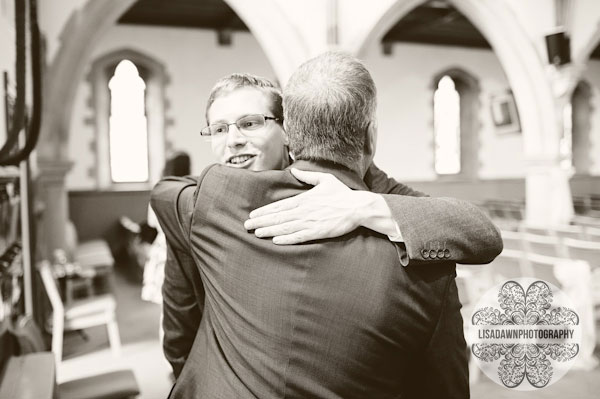 Grooms greets guests