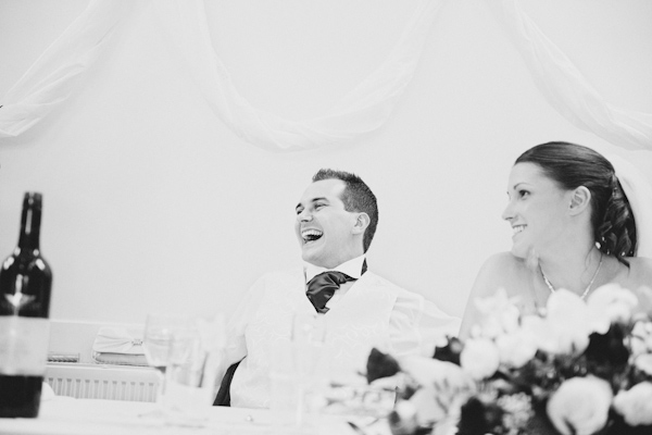 Groom laughing