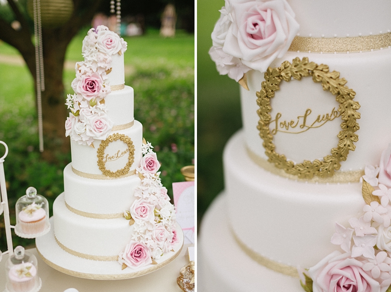 Gold rose tiered wedding cake