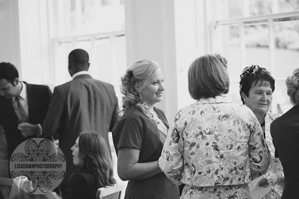 Guests chatting in the orangery