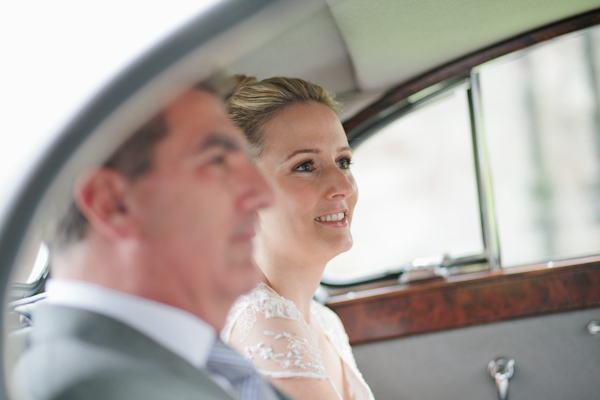 Bride and father in car