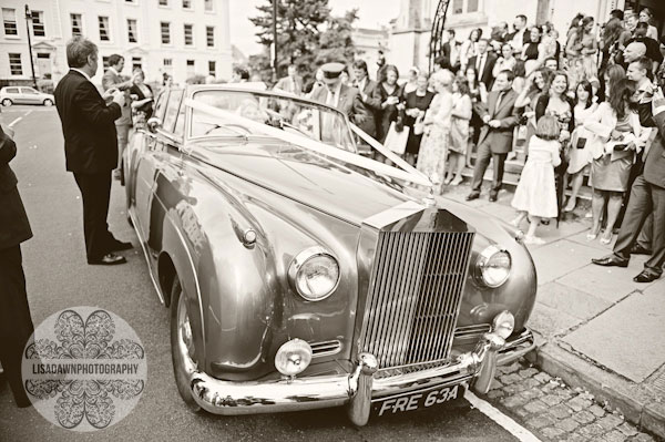 wedding car leaving church