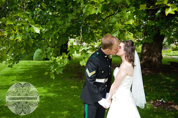 under the trees in the walled garden