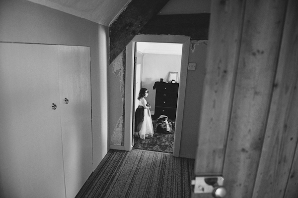 Flower girl standing in doorway