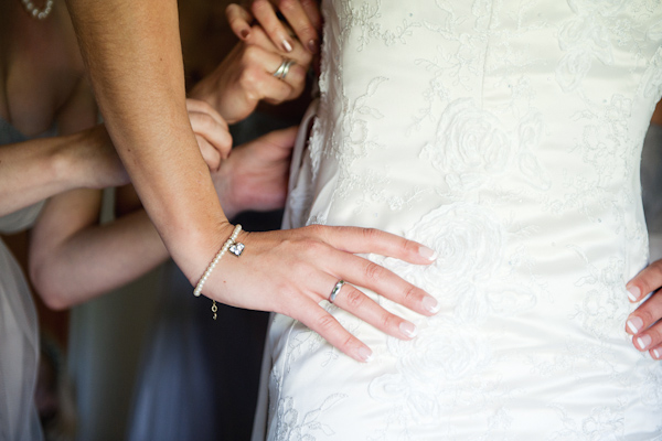 Putting on the wedding dress