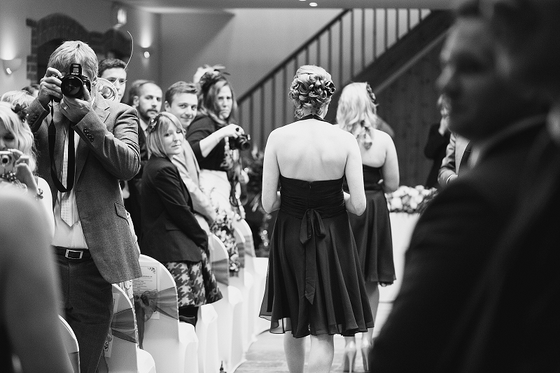 bridesmaids walking down the aisle