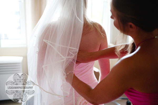 doing up the wedding dress