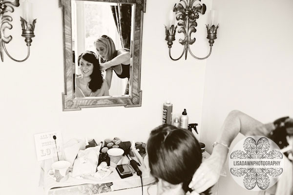 Mirror photograph of bridal preparations