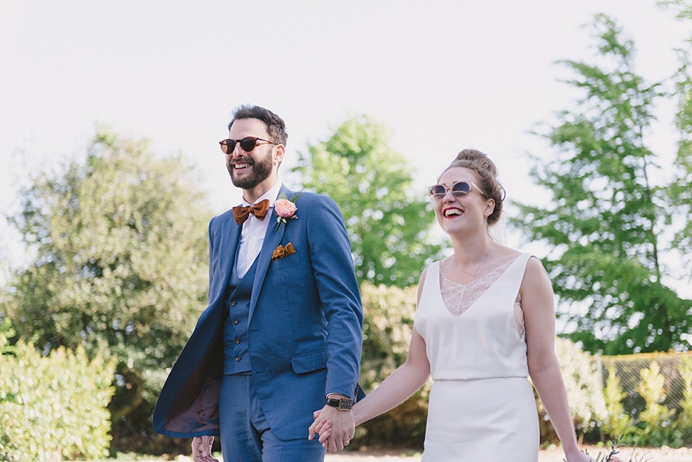 bride and groom in shades