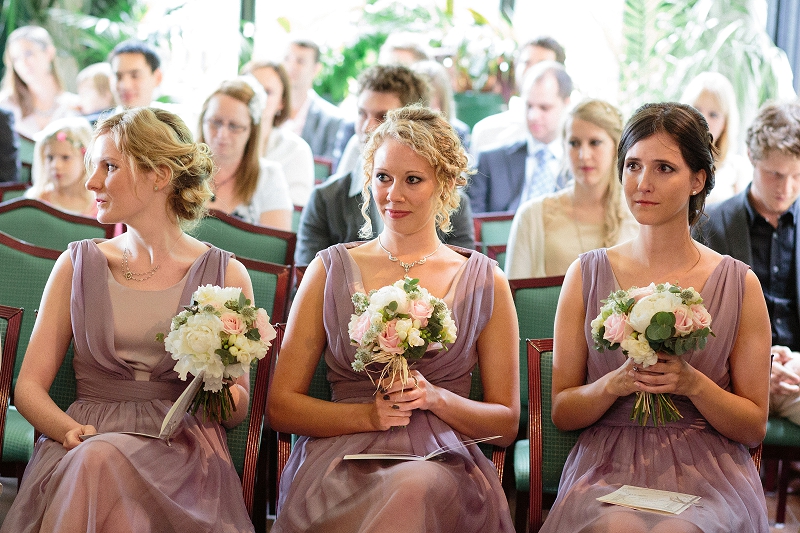 Bridesmaids in purple dresses