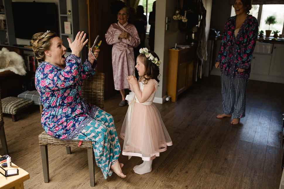 Bride, flower girl, moment